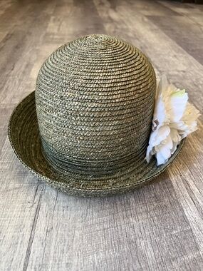 betmar sage green braided straw cloche with white floral tag